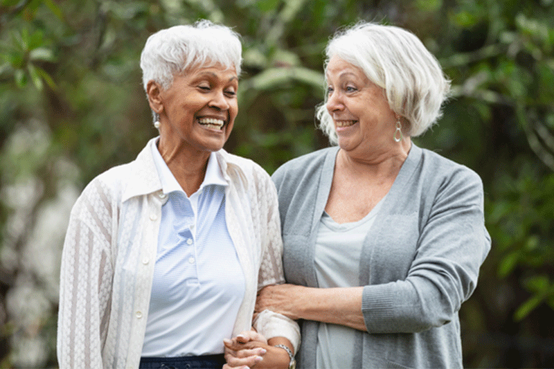 A senior woman is spending time with a loved one with dementia.