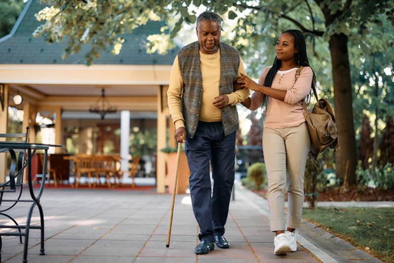A woman feels a lack of support when caring for her aging father, one of the top three challenges caregivers face.